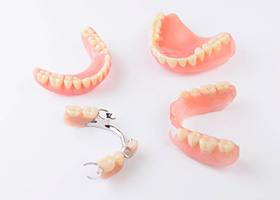 Two full dentures and two partials