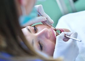 Patient receiving dental treatment