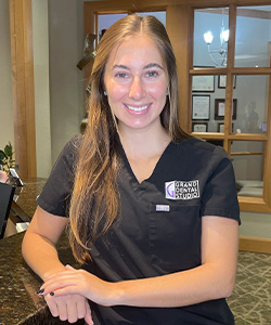 Caring dental hygienist Paige