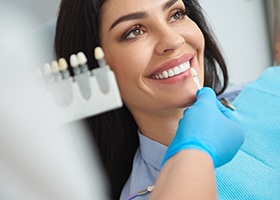 Woman smiling after teeth whitening 