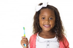 This kid is excited about brushing her teeth!