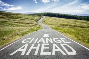 road that says "Change Ahead"