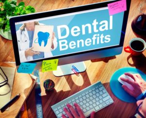 computer monitor that says dental insurance benefits 