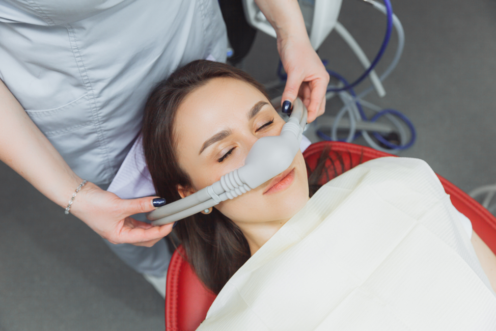woman receiving nitrous oxide at dentist